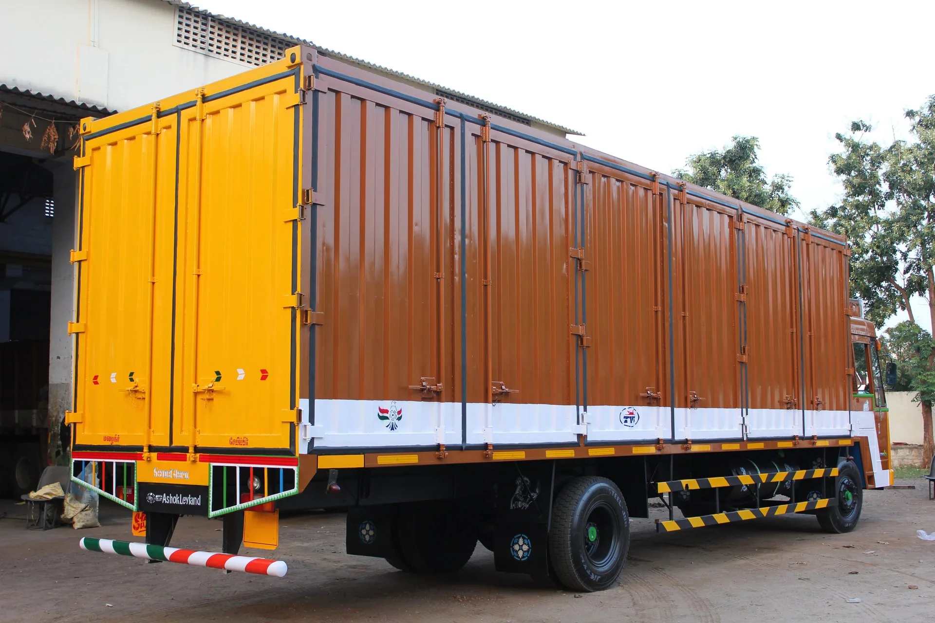 Finished orange enclosed truck body from the KEW project collection