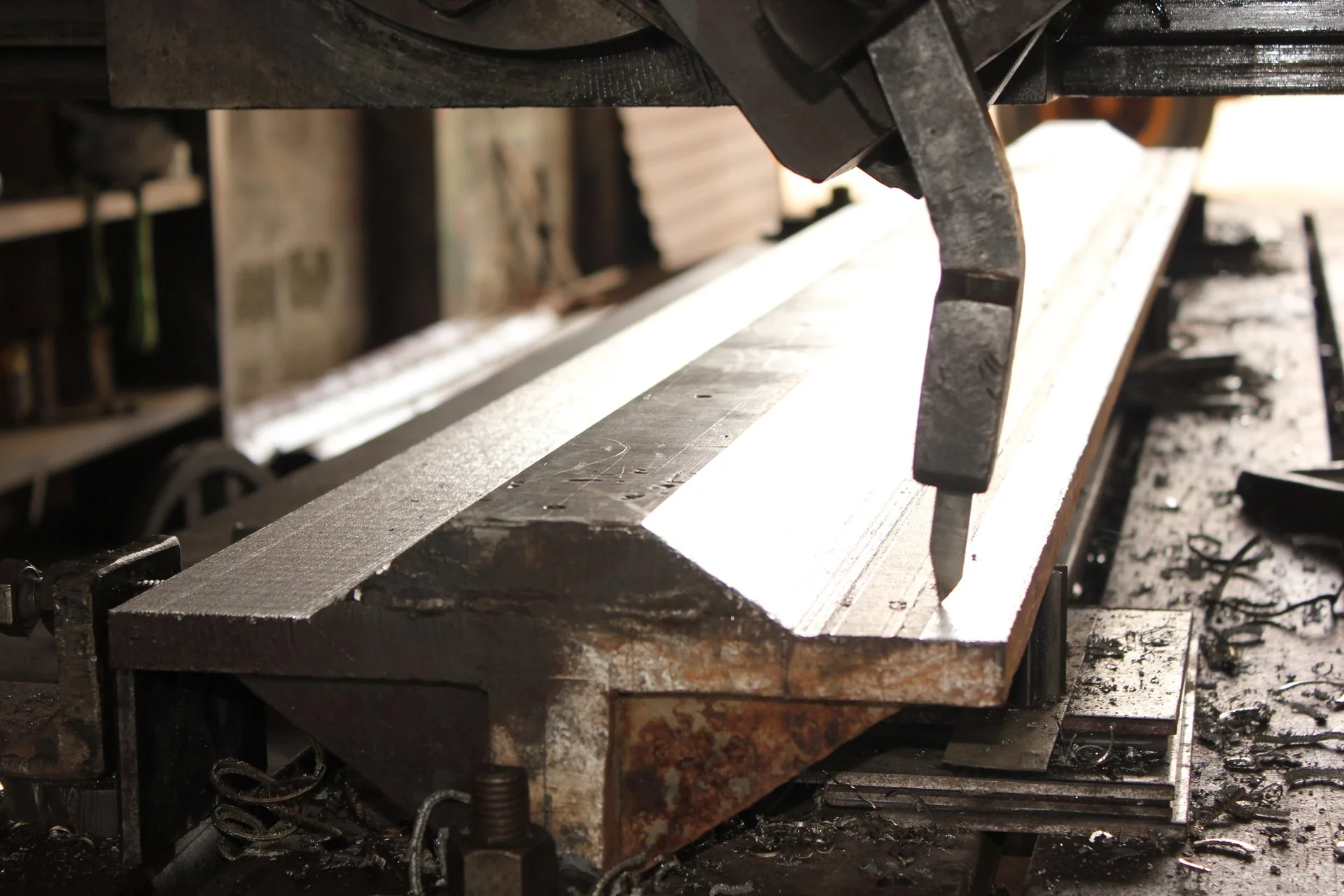 Close-up of a metalworking tool machining a steel component at KEW